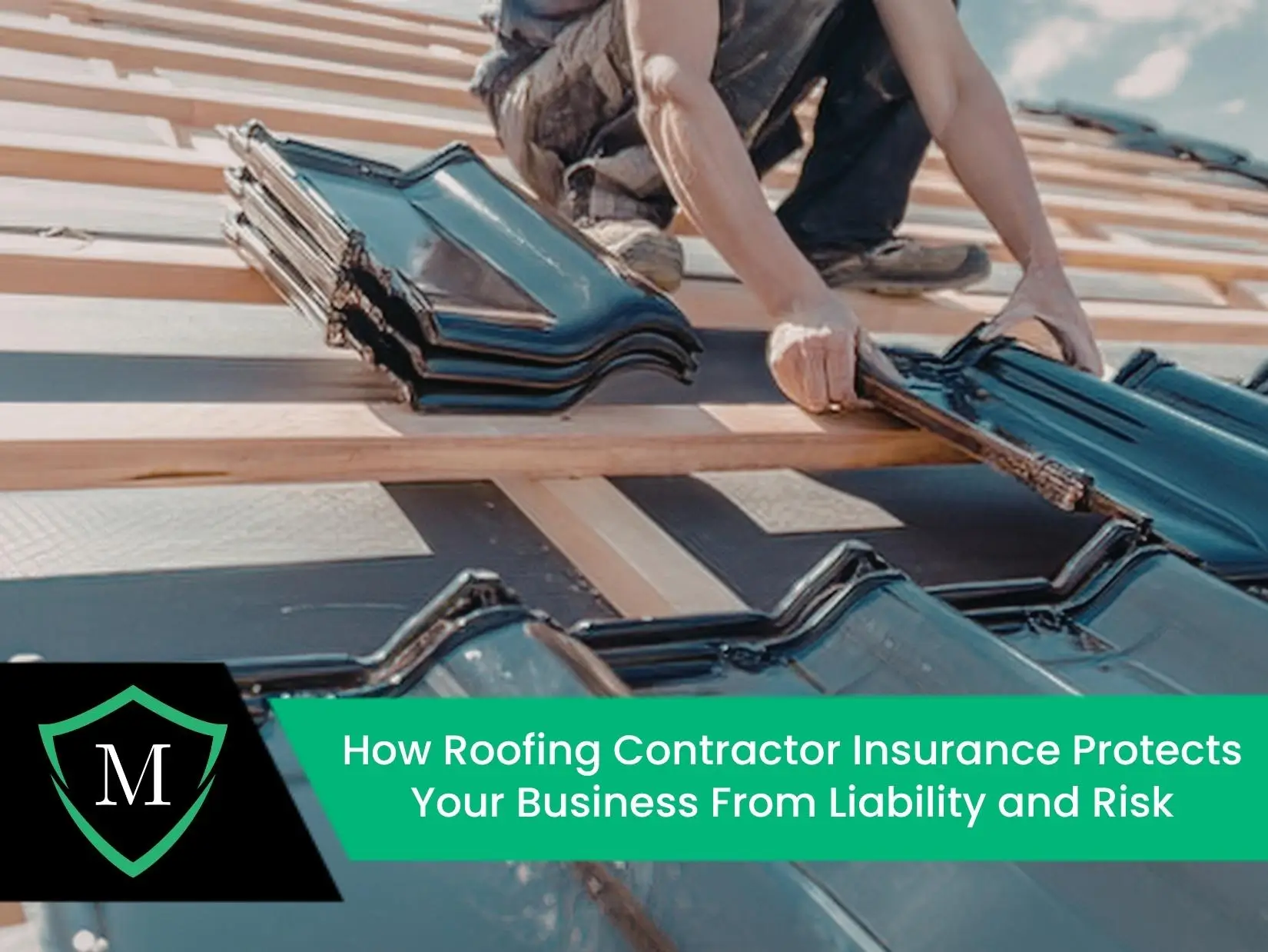 A professional roofing contractor installing dark, glazed roof tiles on a wooden frame during a residential construction project.
