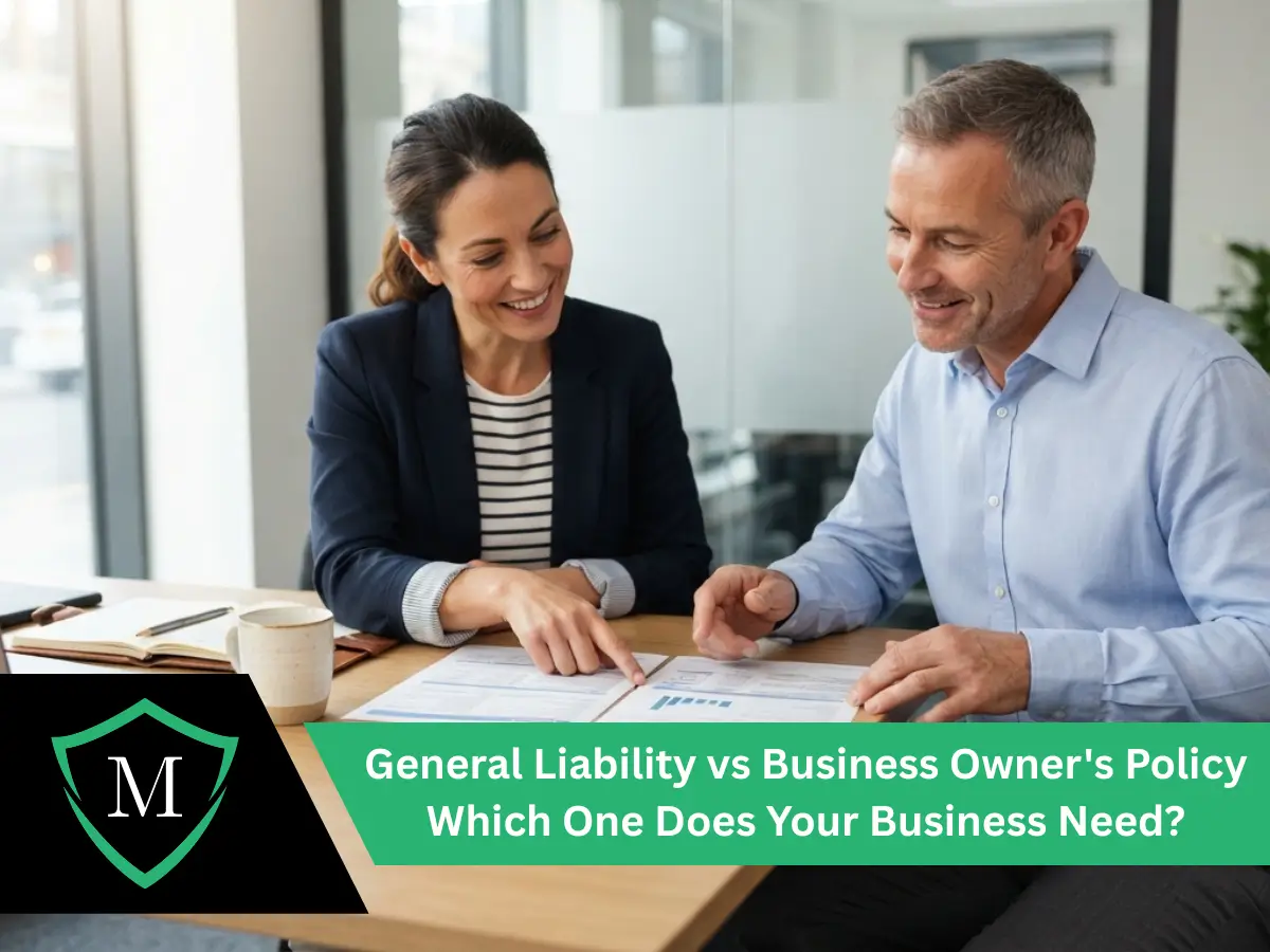 Business advisor and client sitting at conference table reviewing financial policy documents together.